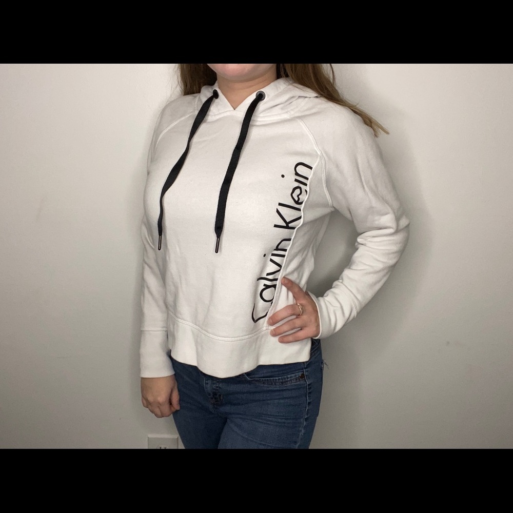 White Calvin Klein sweatshirt, could be crop top!